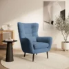 Fotel wypoczynkowy uszak Vence niebieski w tkaninie łatwoczyszczącej welur nóżki czarne