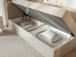 Łóżko młodzieżowe 90x200 cm Calmmo lewostronne z pojemnikiem jasnobeżowe szenil hydrofobowy