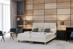 Łóżko tapicerowane 80x200 cm Donbay z wezglowiem panelowym i materacem kieszeniowym kremowe welur hydrofobowy