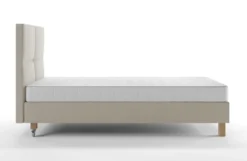 Łóżko tapicerowane 80x200 cm Donbay z wezglowiem panelowym i materacem kieszeniowym jasnobeżowe welur hydrofobowy
