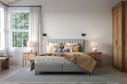 Łóżko tapicerowane 160x200 cm Fiorelle z pojemnikami jasnoszare plecionka hydrofobowa