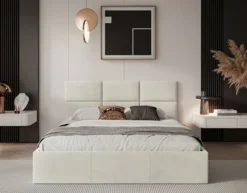 Łóżko tapicerowane 140x200 cm Nestio z pojemnikiem i metalowym stelażem kremowy welur