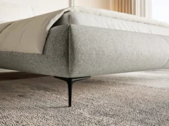 Łóżko tapicerowane 140x200 cm Ovalle z pojemnikiem stelaż metalowy szare plecionka hydrofobowa nóżki czarne