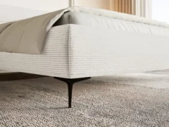 Łóżko tapicerowane 140x200 cm Roule Cord z pojemnikiem stelaż metalowy kremowe sztruks nóżki czarne