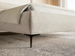 Łóżko tapicerowane 180x200 cm Roule Cord jasnobeżowe sztruks nóżki czarne
