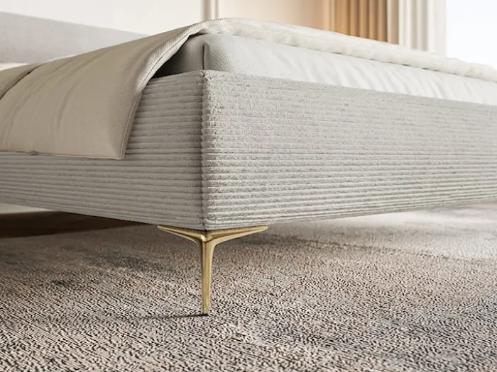 Łóżko tapicerowane 180x200 cm Roule Cord z pojemnikiem stelaż metalowy szarobeżowe sztruks nóżki złote