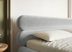 Łóżko tapicerowane 140x200 cm Roule z pojemnikiem stelaż metalowy jasnoszare welur hydrofobowy nóżki czarne