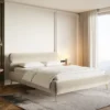 Łóżko tapicerowane 140x200 cm Roule z pojemnikiem stelaż metalowy jasnobeżowe welur hydrofobowy nóżki złote