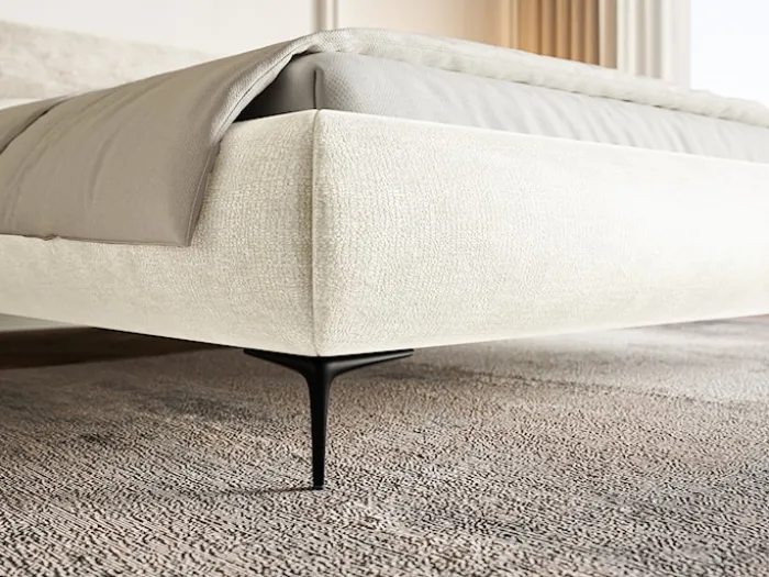 Łóżko tapicerowane 140x200 cm Roule z pojemnikiem stelaż metalowy kremowe szenil nóżki czarne