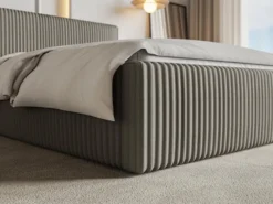 Łóżko tapicerowane 180x200 cm Tilio z pojemnikiem stelaż metalowy szarobeżowe gruby sztruks