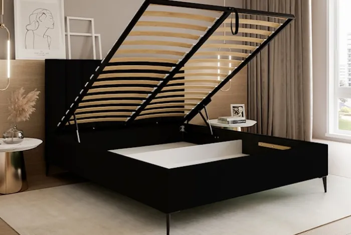 Łóżko tapicerowane 160x200 cm Veloro z pojemnikiem czarne welur stelaż metalowy na wysokich nóżkach