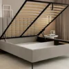Łóżko tapicerowane 160x200 cm Veloro z pojemnikiem ciemnobeżowe welur stelaż metalowy na wysokich nóżkach