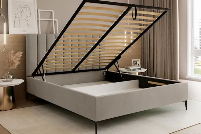Łóżko tapicerowane 160x200 cm Veloro z pojemnikiem ciemnobeżowe welur stelaż metalowy na wysokich nóżkach