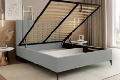 Łóżko tapicerowane 160x200 cm Veloro z pojemnikiem jasnoszare welur stelaż metalowy na wysokich nóżkach