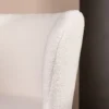 Krzesło tapicerowane Muells białe w tkaninie boucle