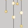Lampa wisząca Systally LED 200 cm złoto-czarna