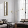 Lustro ścienne Thelmen 132x37 cm w złotej ramie