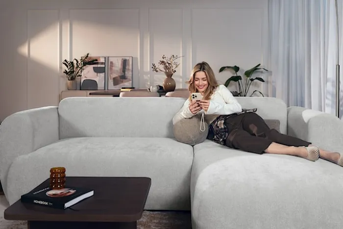 Narożnik z funkcją spania Emia L-kształtny prawostronny jasnoszary szenil